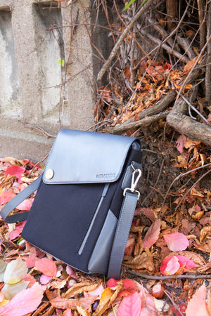 cross body shoulder bag in leather and canvas